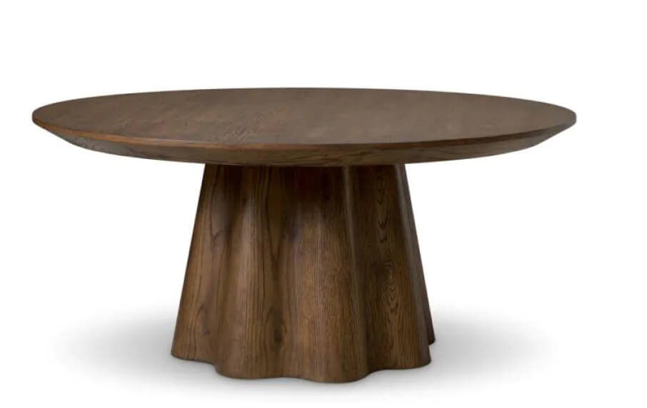 Wooden table with a unique base design on a white background